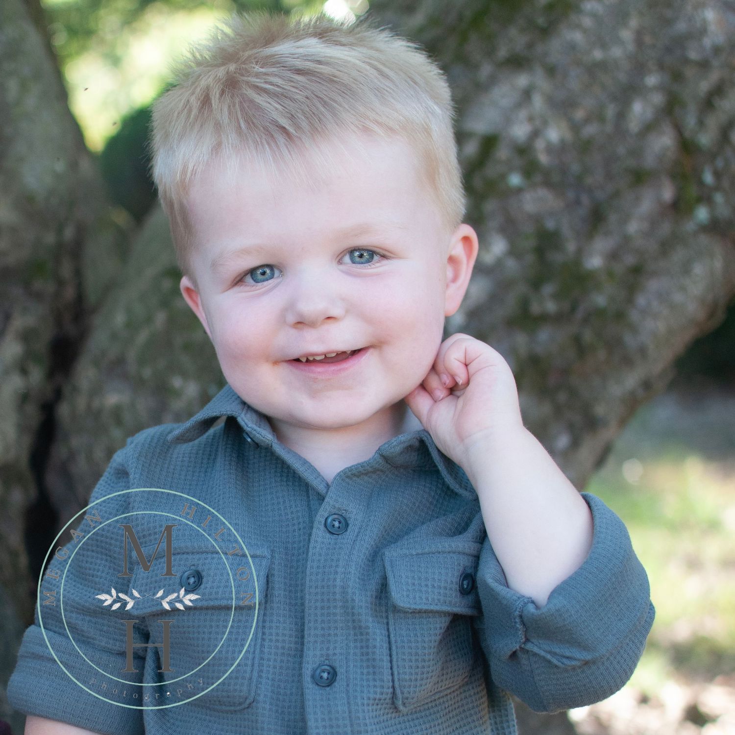 toddler boy photo near tree