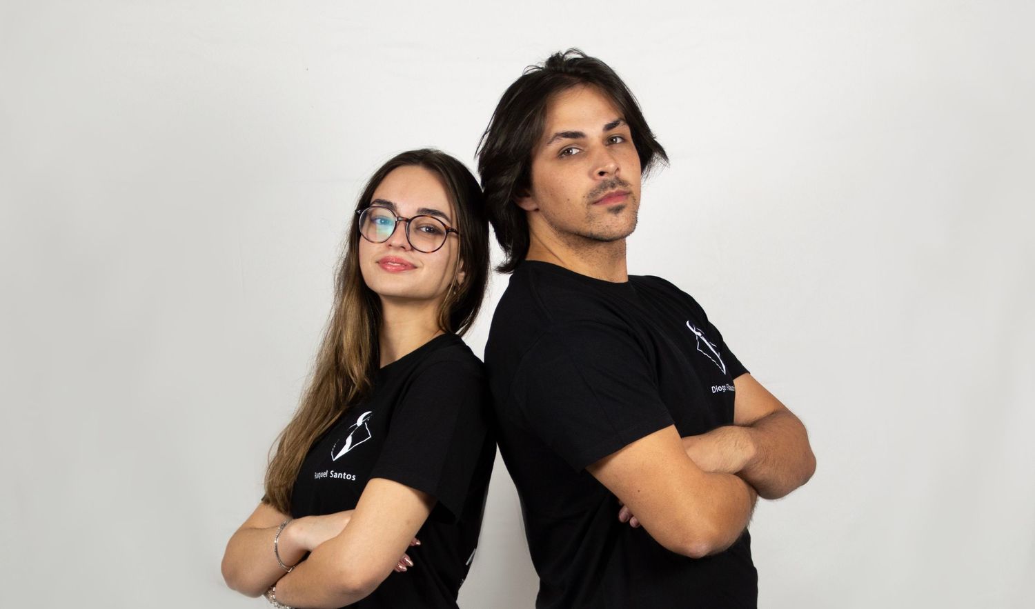 Studio portraits against white background showing casual poses.