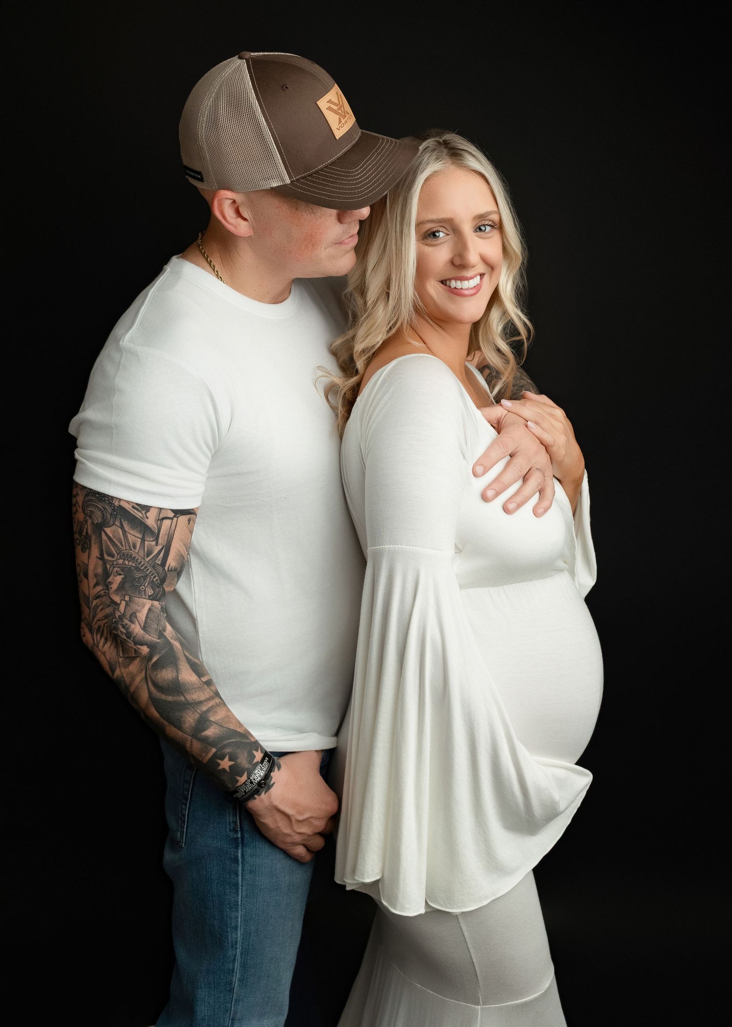 Dad holding Mom's chest at her maternity session. Greenville, SC newborn photographer, Easley SC newborn photographer