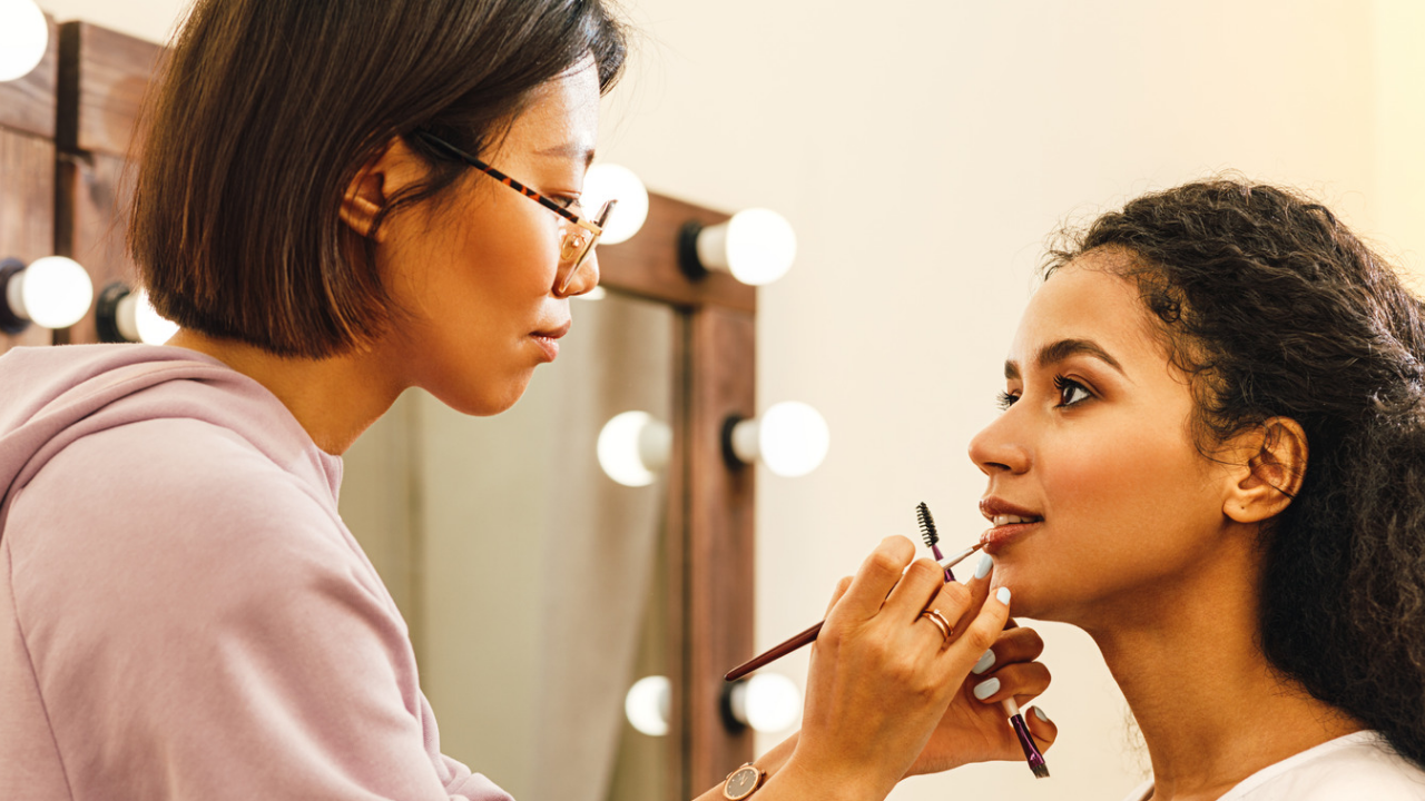 Grooming - makeup - adding lipstick to the lips