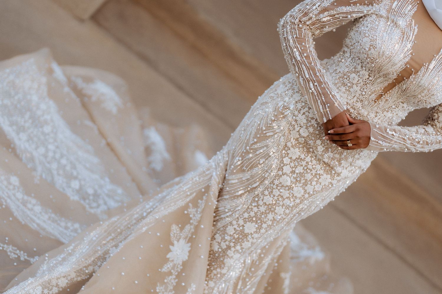 Pre-wedding photoshoot in Dubai – close-up detail of embroidered white wedding dress