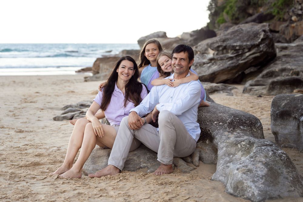 Freshwater family photoshoot at the beach with a family of four with two daughters