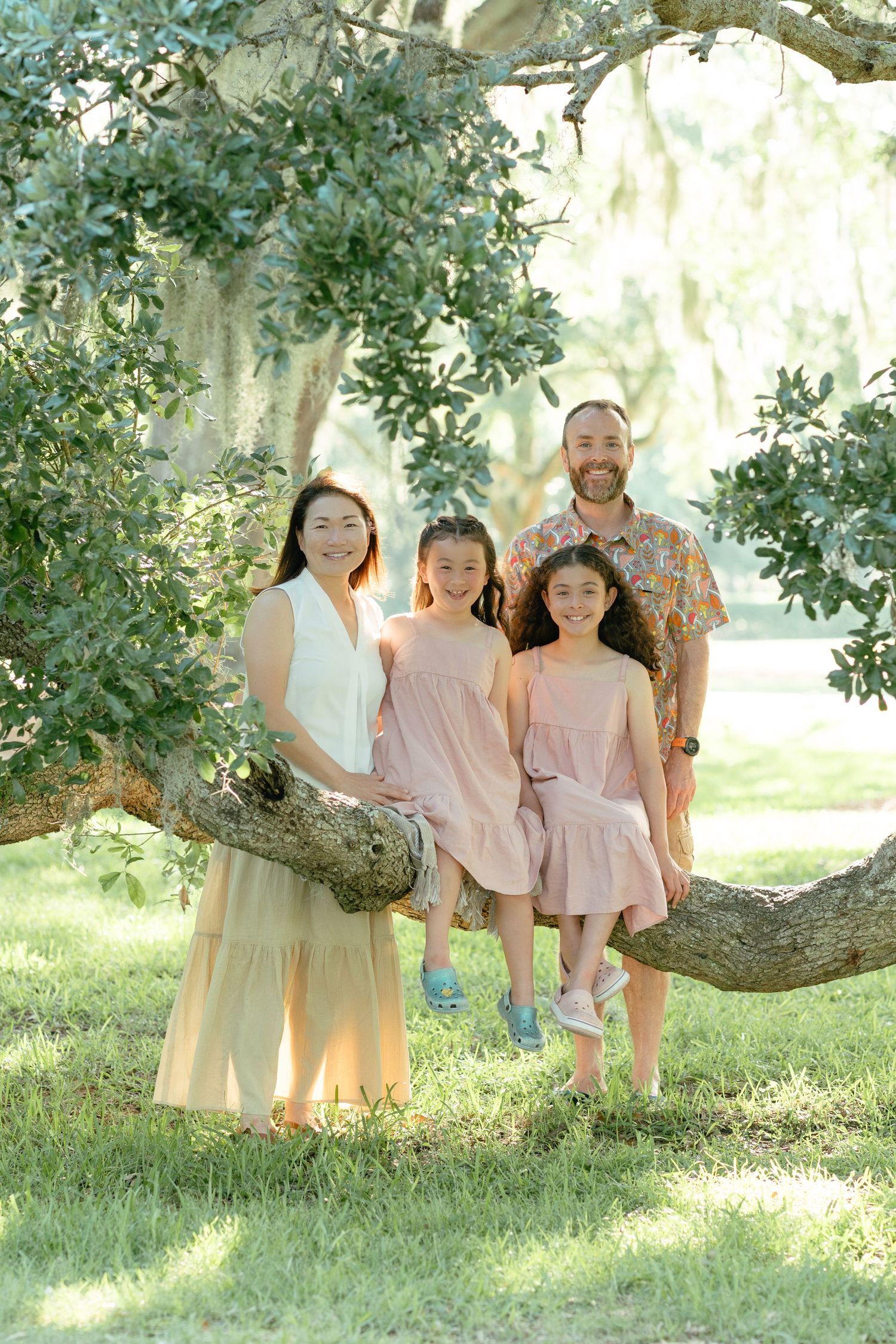 Golden hour portraits Avenue of the Oaks of a family during their St Simons Island vacation weekend getaway.