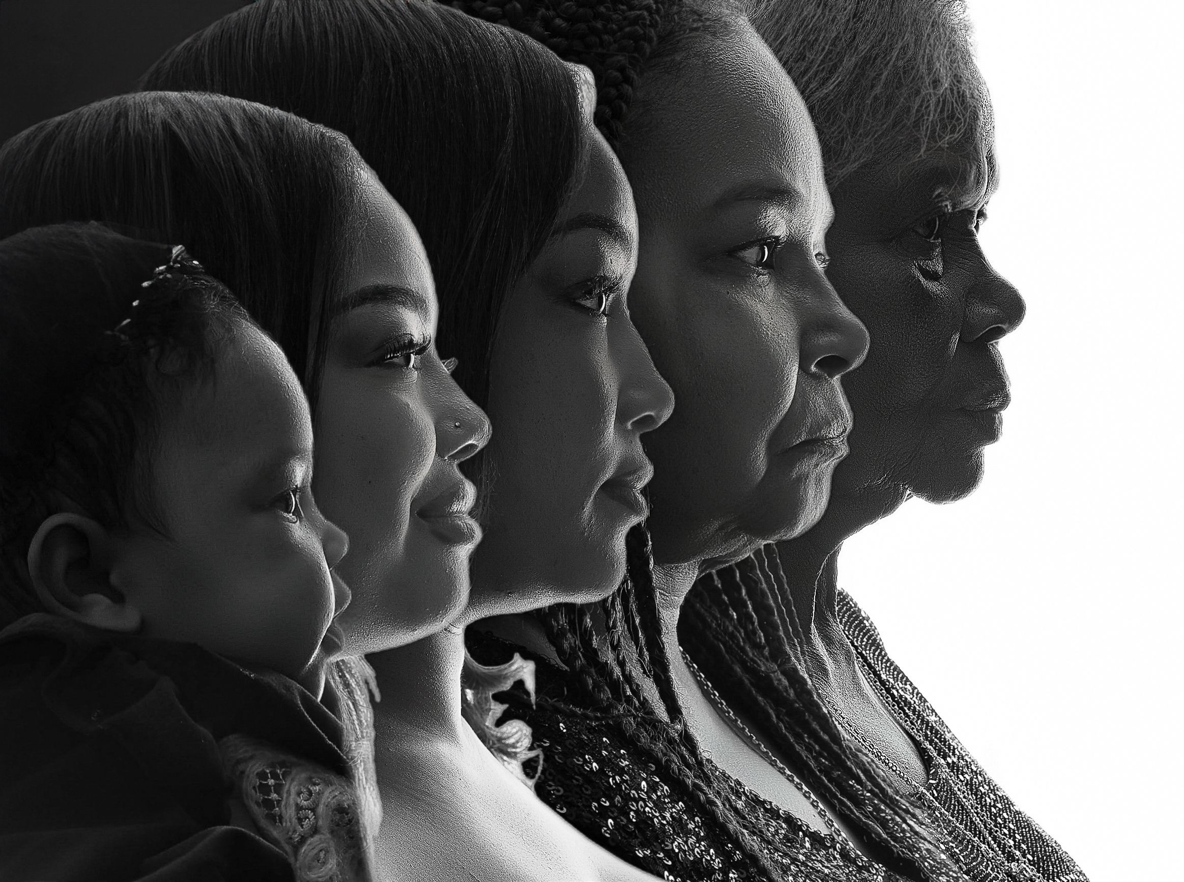 Black and white profile portraits of people arranged in a row showing different expressions and angles.