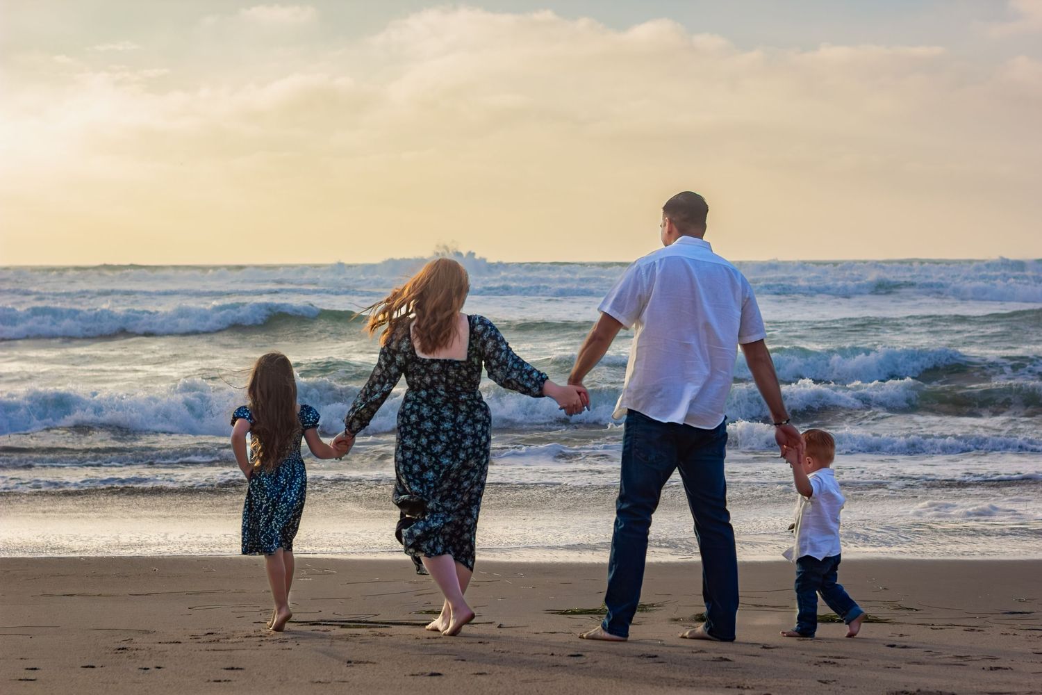 Family beach portrait session at golden hour. Lompoc, Santa Barbara, and San Luis Obispo County Photographer.