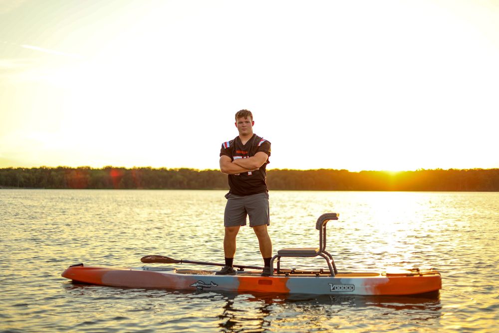 senior photo male lake football