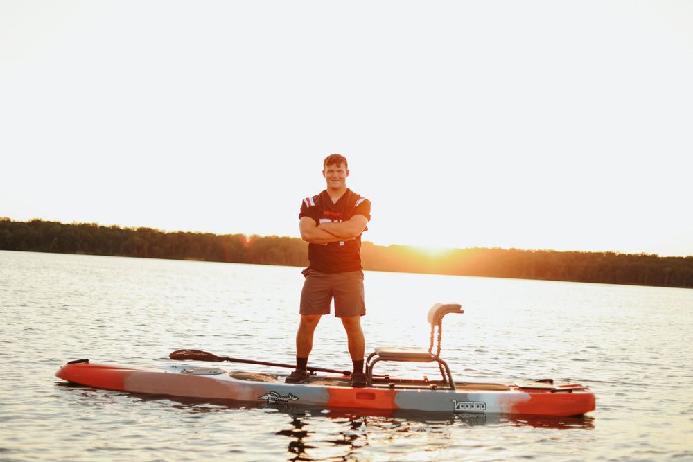 senior photo male lake football