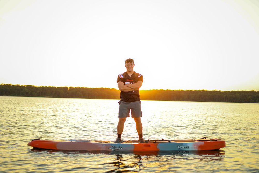 senior photo male lake football