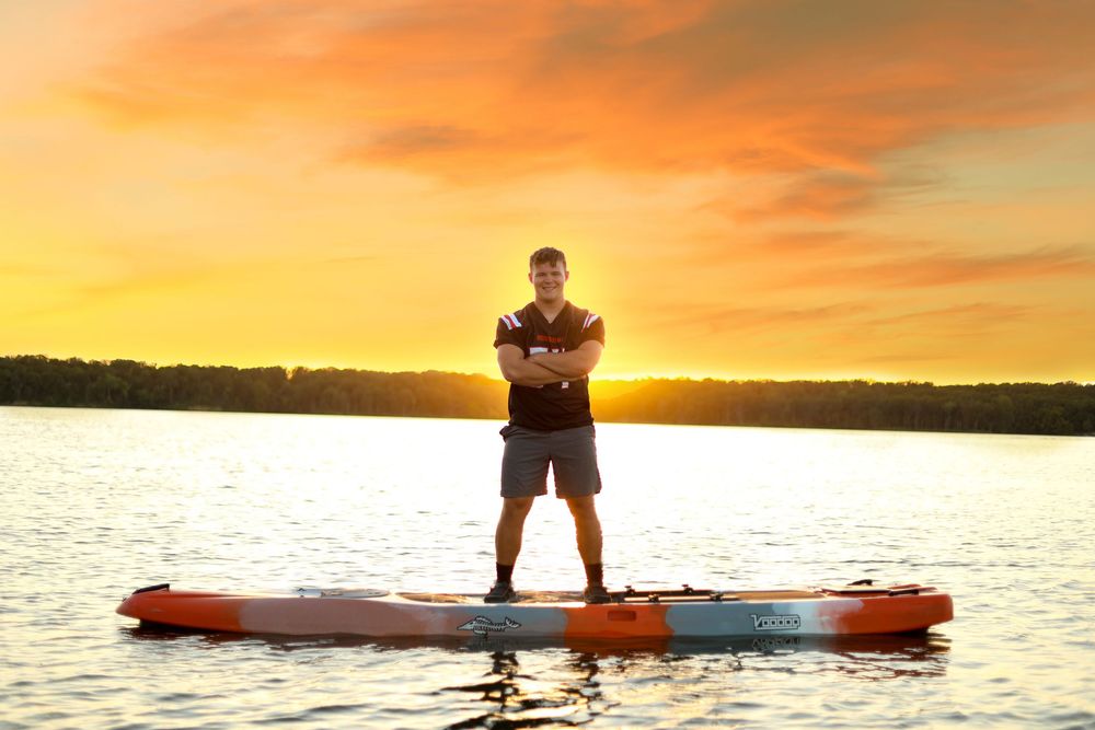 senior photo male lake football