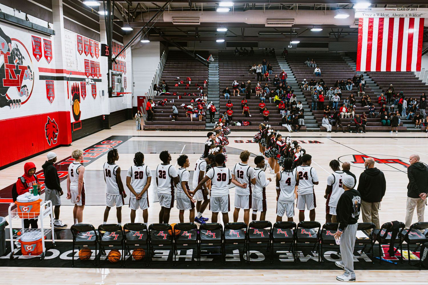 Mens Basketball team moments before the santional anthem