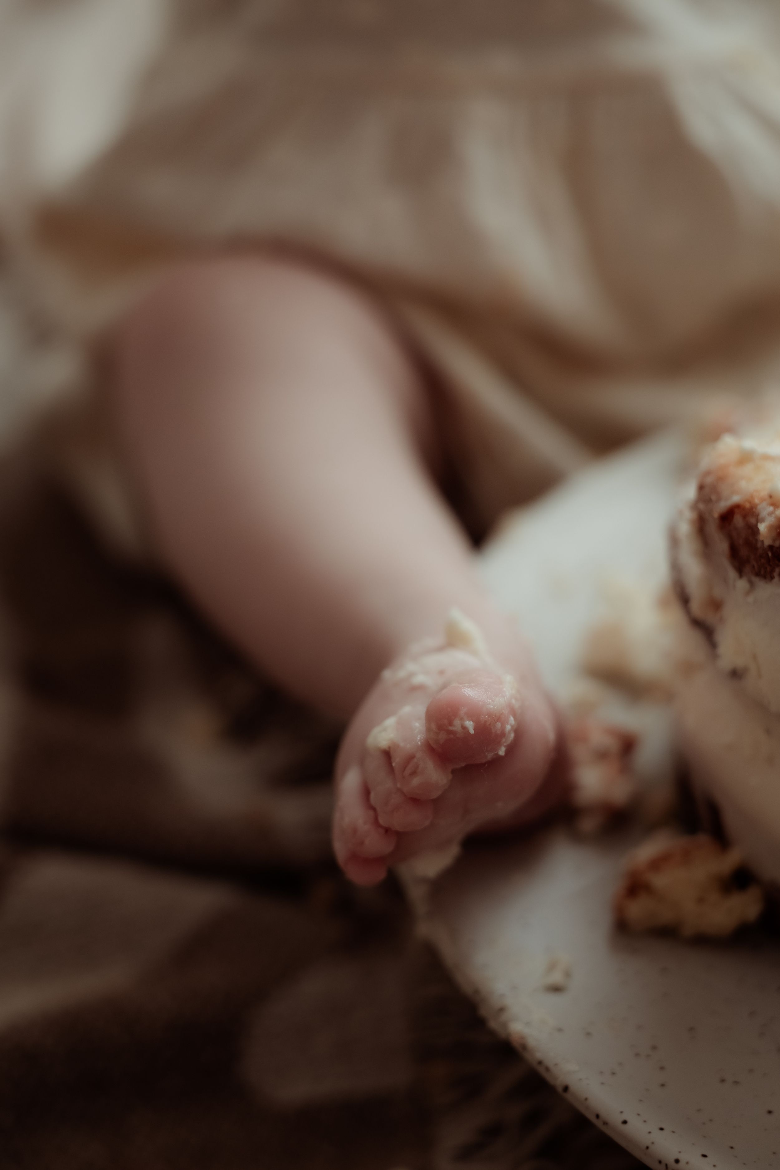 A series of close-up photos showing small pink newborn animal paws against a soft blurred background.