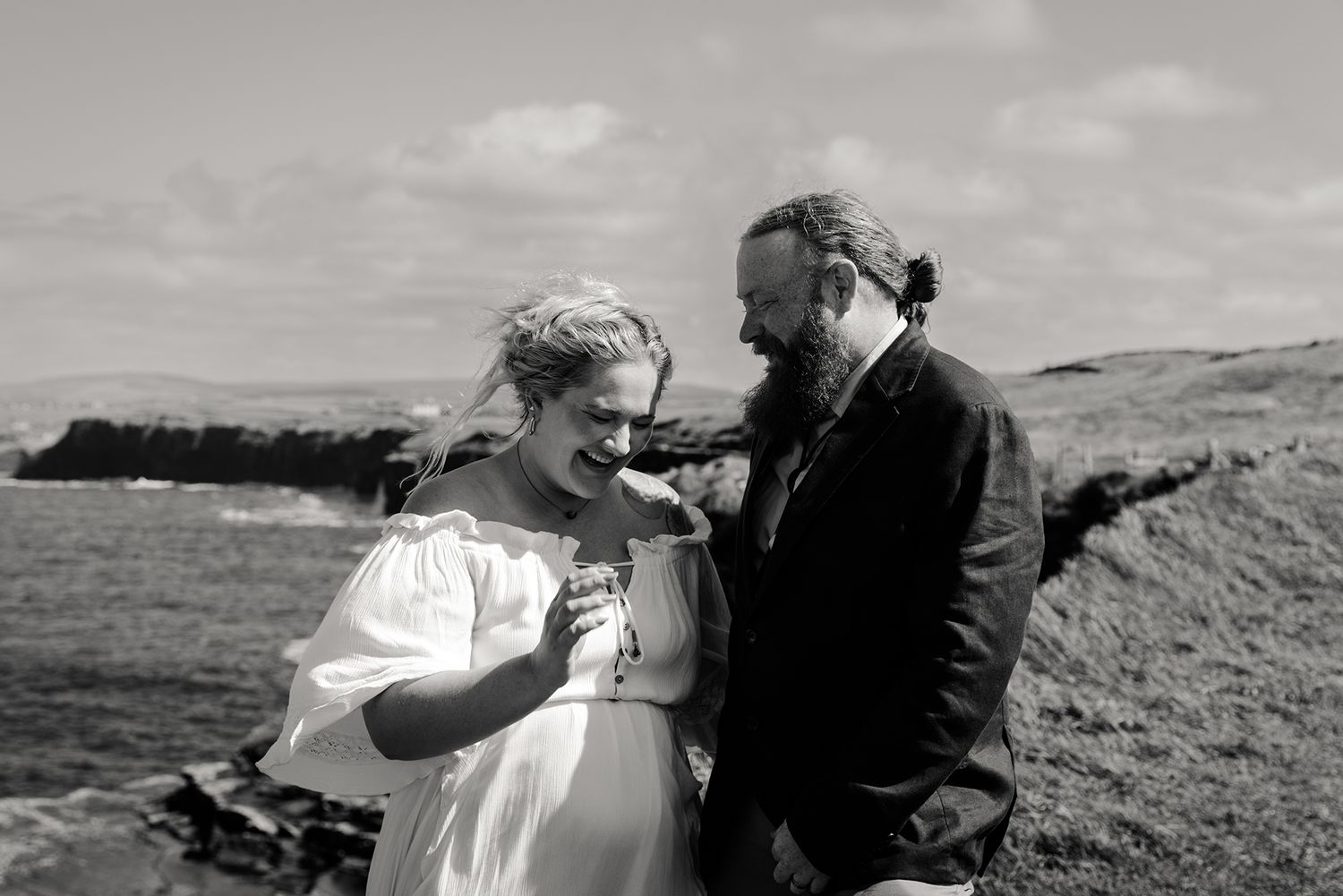 Couple laughing together during Hags Head Cliffs of Moher elopement