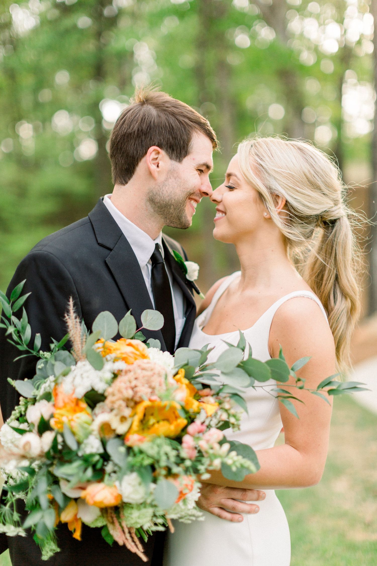 bride and groom portrait at peachtree falls wedding ceremony at Lanier islands wedding venue