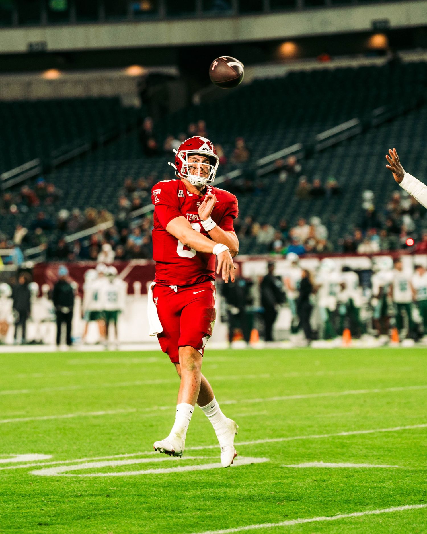 A sequence of football kicking motion frames showing a player in red uniform executing a field goal attempt.
