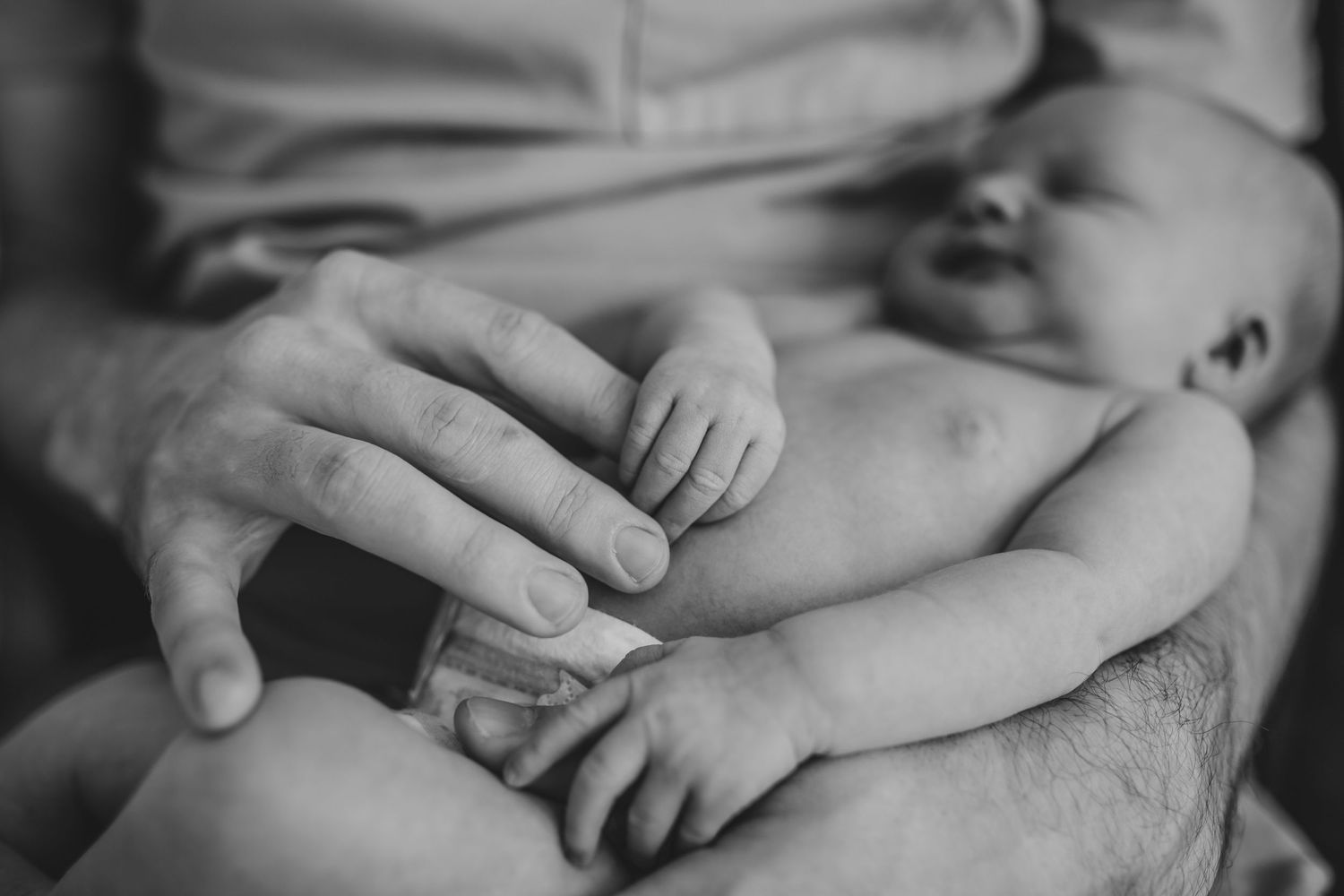 Black and white close-up photo series showing gentle hand gestures and intimate human touches.