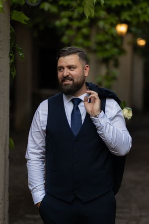 Groom portrait in suit during wedding preparation in Gauteng with natural, relaxed style