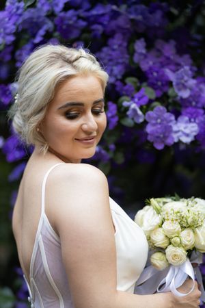 Bride portrait holding bouquet during wedding in Gauteng with natural, elegant style