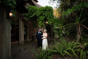 Bride and groom standing together at wedding venue in Gauteng with natural, relaxed style