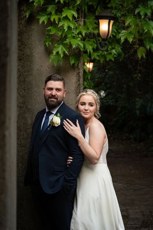 Bride and groom posing together at wedding venue in Gauteng with natural, relaxed style