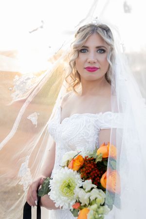 Bride portrait holding bouquet during wedding in Gauteng with soft, natural light