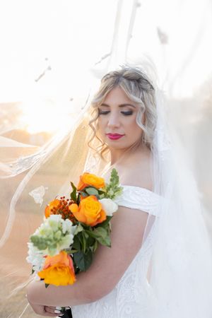 Bride holding bouquet during wedding portraits in Gauteng with soft, natural light