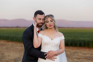 Bride and groom embracing during wedding portraits in Gauteng with natural, relaxed style