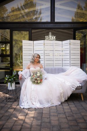 Bride portrait with bouquet during wedding preparation in Pretoria with natural, elegant bridal styling and timeless details