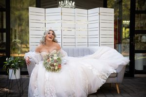 Bride portrait with bouquet during wedding preparation in Centurion with natural, elegant bridal styling