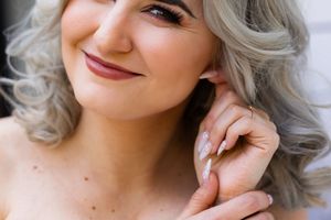 Bride portrait detail during wedding preparation in Gauteng with natural, elegant styling
