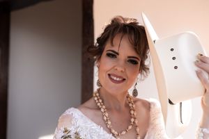 Bride getting ready with natural makeup and hair during wedding preparation in Gauteng