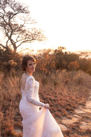 Bride portrait in golden light during wedding in Gauteng with natural, relaxed style