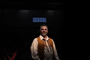 Groom portrait in low light during wedding preparation in Gauteng