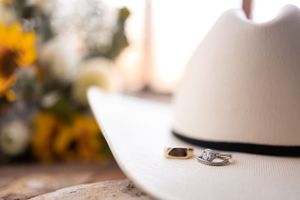 Wedding detail with rings and hat during wedding preparation in Gauteng