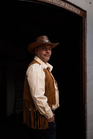 Groom portrait wearing hat during wedding preparation in Gauteng