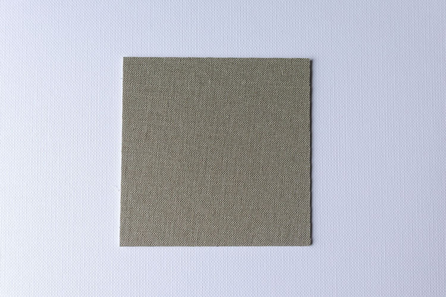 A series of five dark blue rectangular fabric swatches arranged in a horizontal row against a light background.