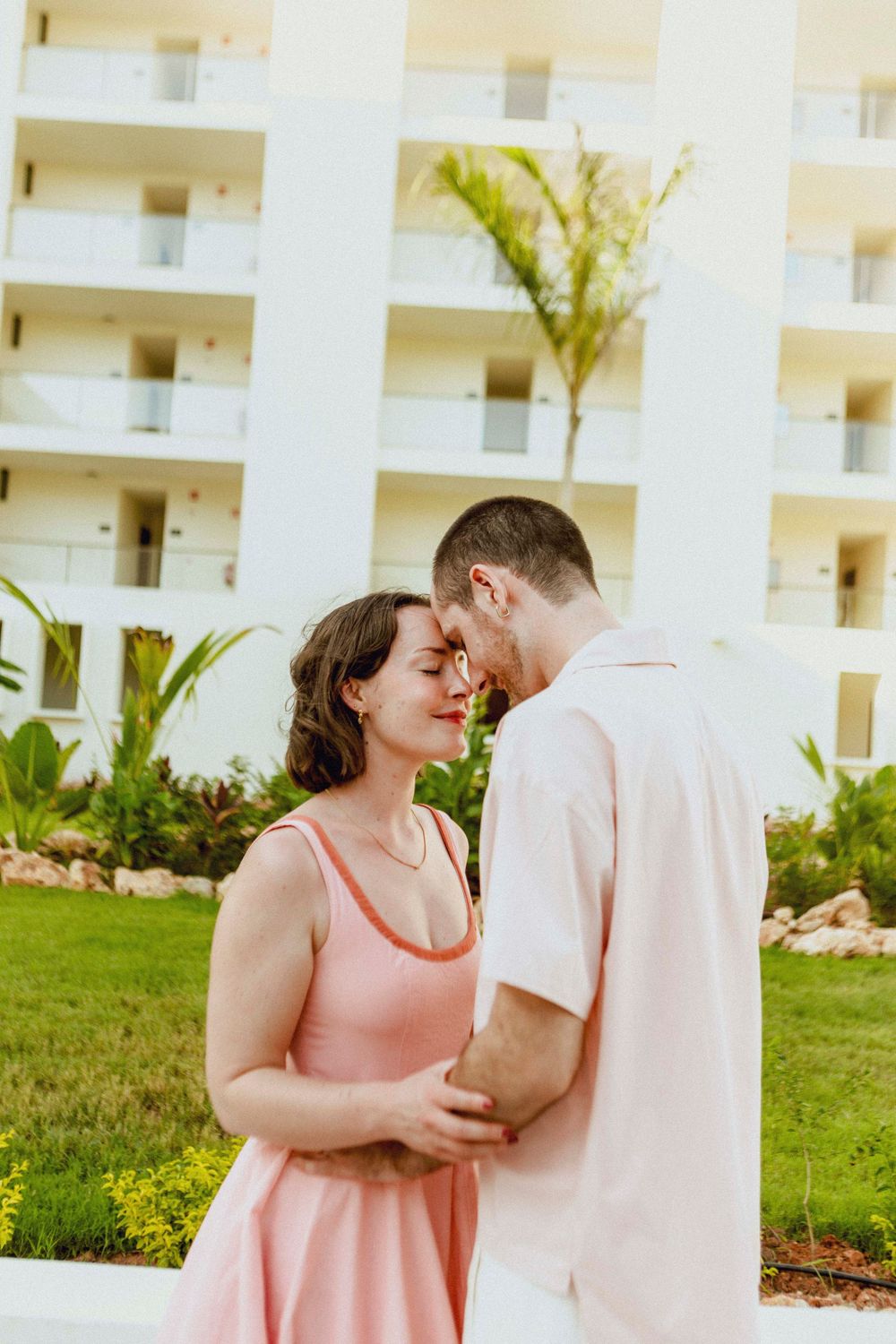 Wedding couple under palm trees in Zanzibar
