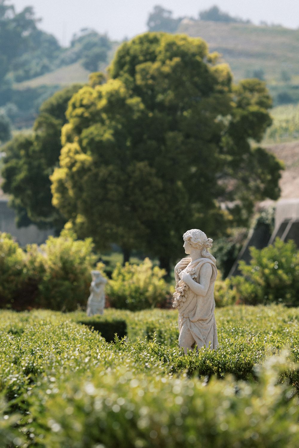 Classical garden statue at Palácio do Correio-Mor wedding venue in Portugal