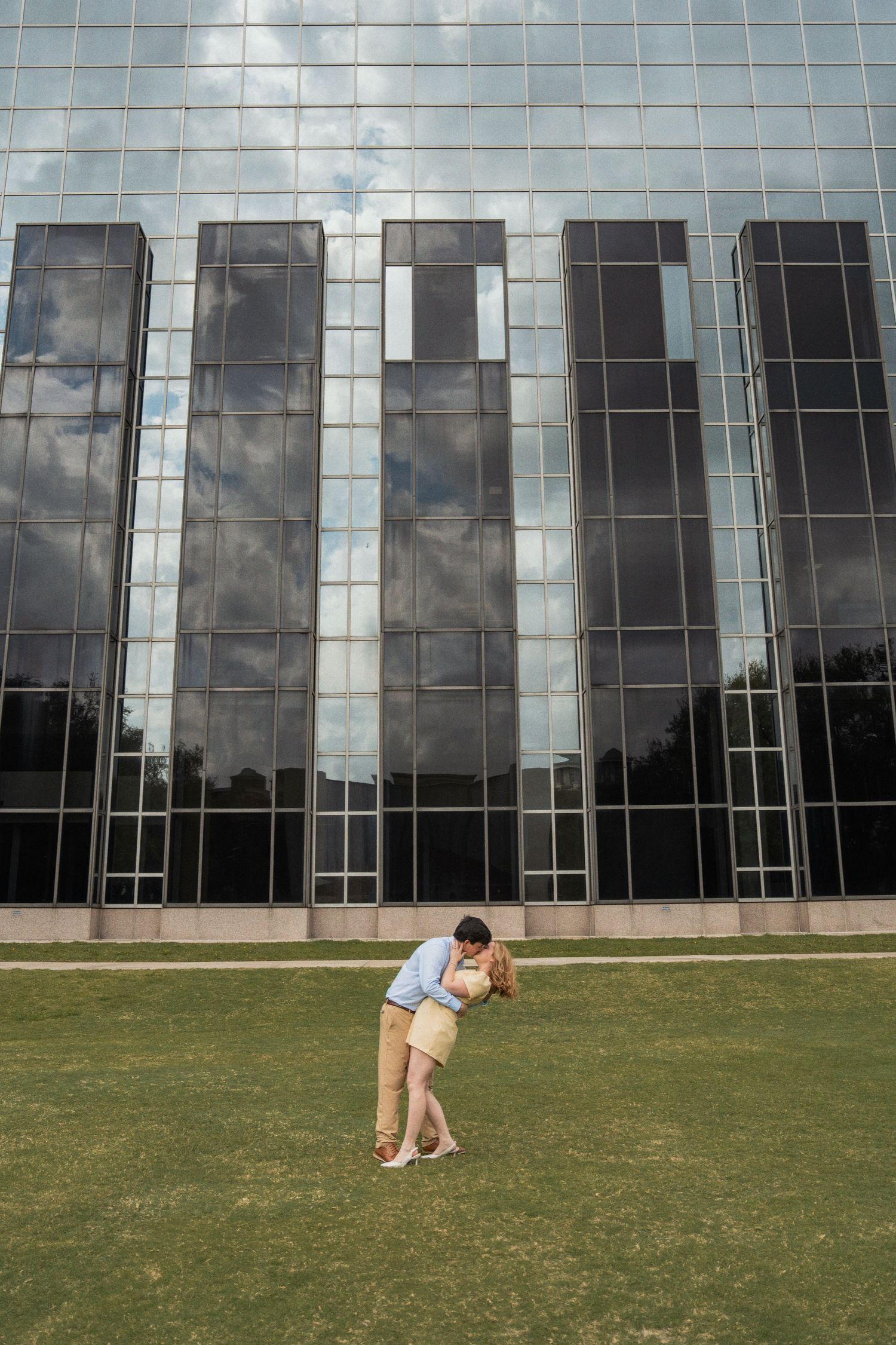 A series of proposal photos captured outside a modern glass office building on a sunny day.