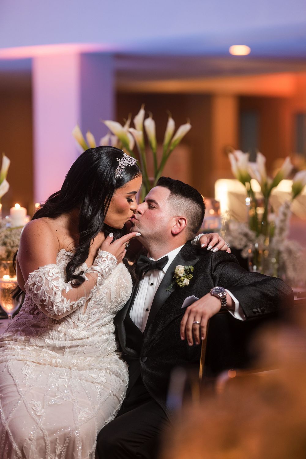 Bride dancing with guest during wedding reception at Royal Sonesta Puerto Rico