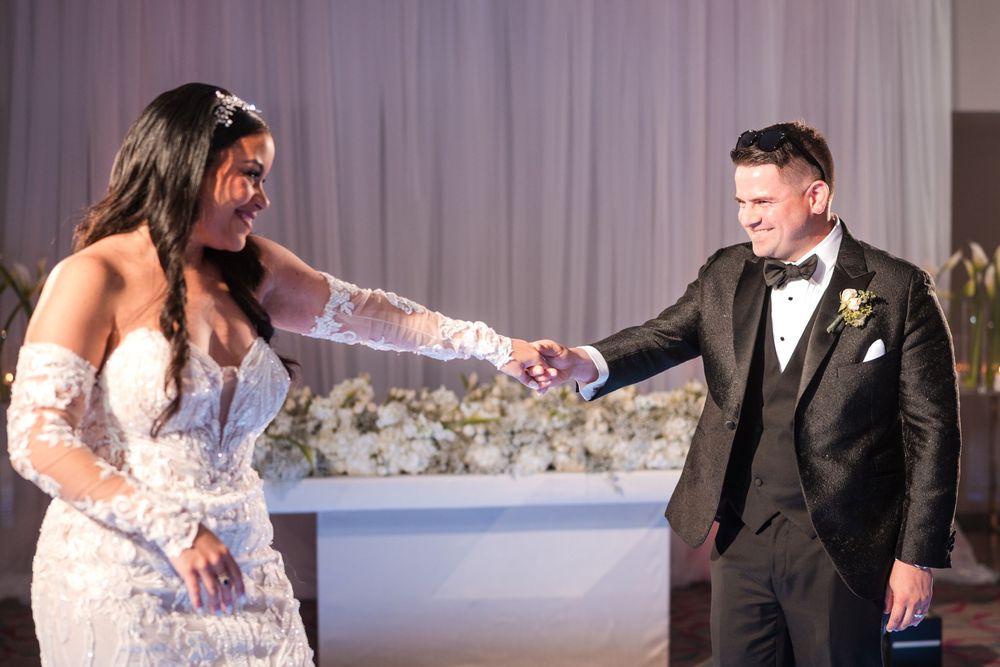 Bride and groom dancing together during reception at Royal Sonesta Puerto Rico