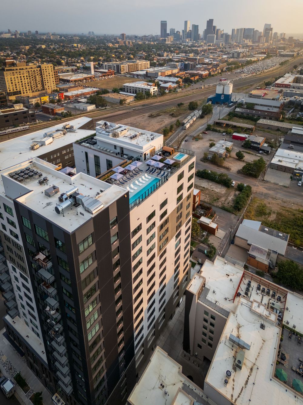 Aerial/Drone shot of Rose & Thorn's rooftop pool & Denver by Hospitality, Travel & Tourism photographer Captain Colorado Photography.