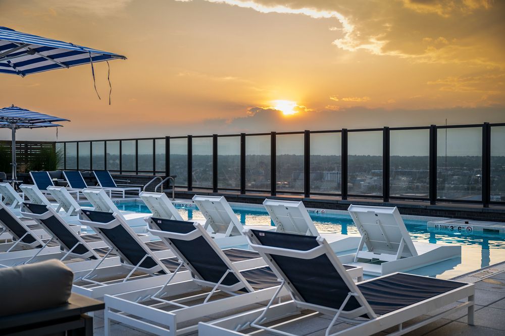 Sunset shot of the pool at Rose & Thorn in Denver by Denver Hospitality, Travel & Tourism photographer Captain Colorado Photography.