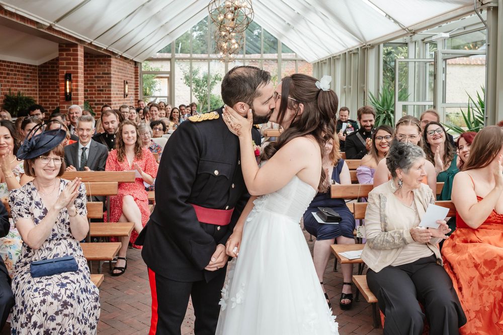 Syrencot House wedding venue Wiltshire Georgian manor first kiss in glasshouse ceremony