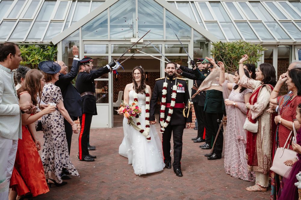 Syrencot House wedding venue Wiltshire Georgian manor couple exiting the glasshouse after ceremony