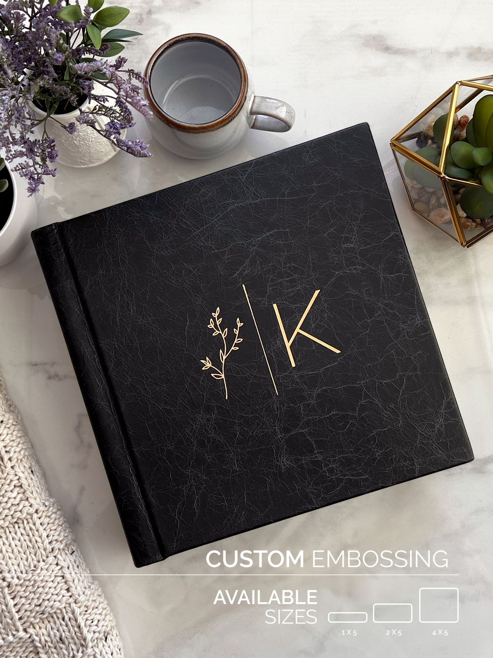 Close-up of a luxury heirloom wedding album with premium leather and custom embossing. Elegant, high-end fine art wedding book for couples.