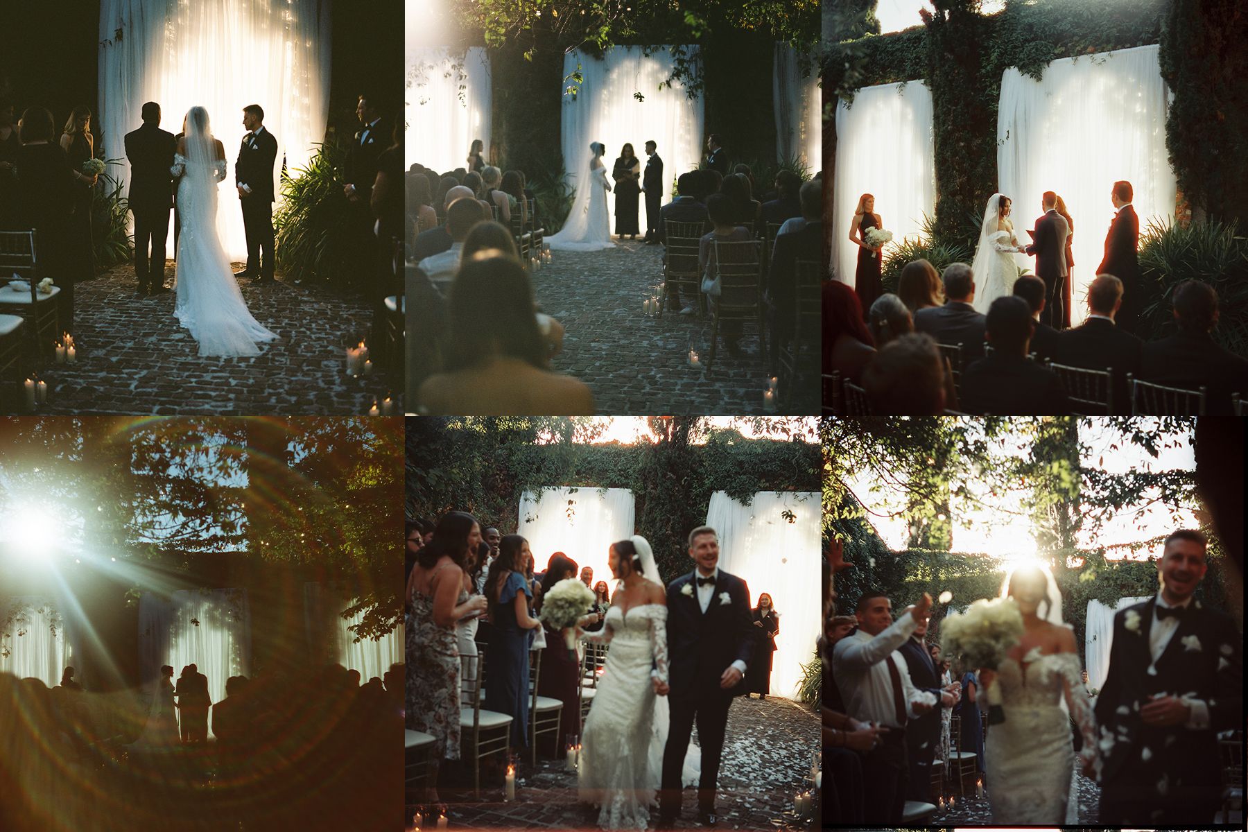 Silhouettes of wedding guests mingle during an evening outdoor celebration.