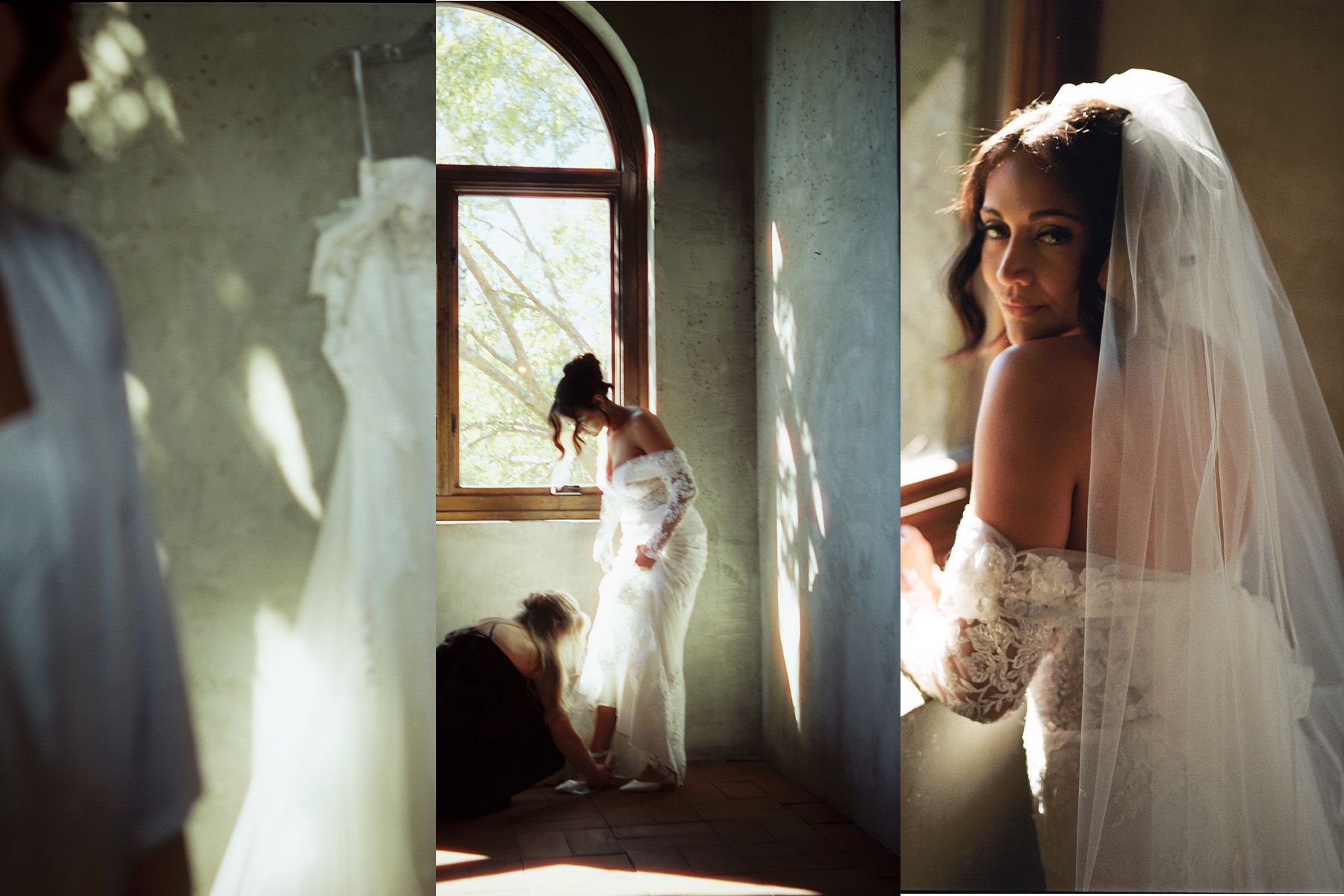 Soft window light illuminates a bridal preparation room with flowing white fabric.
