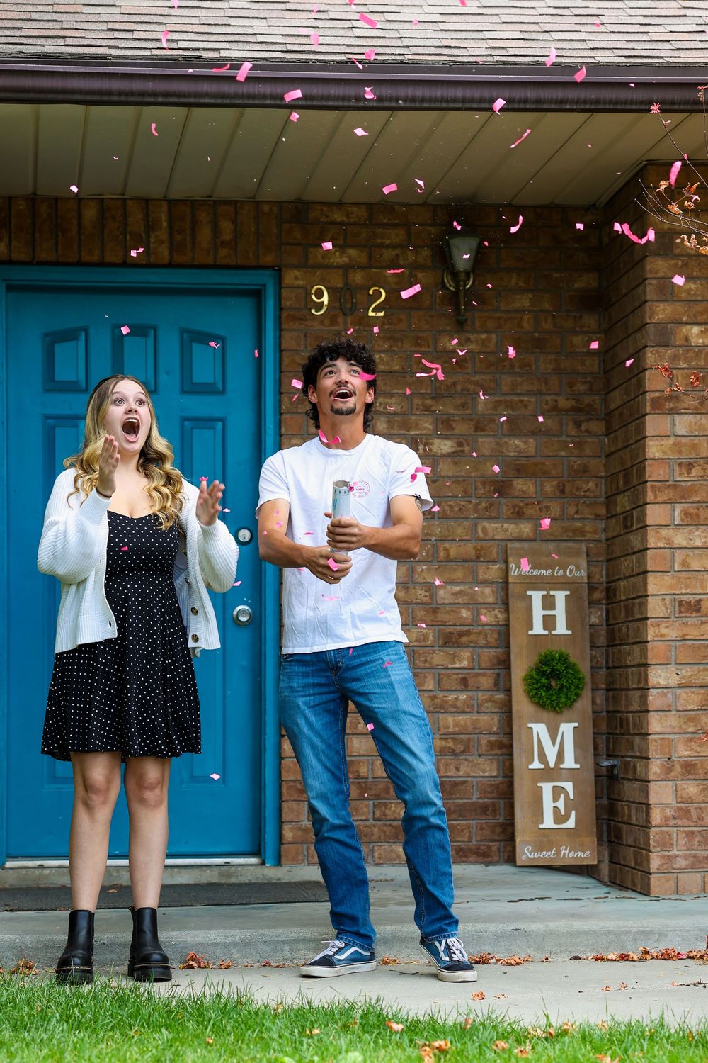 Excited couple during their baby's gender reveal