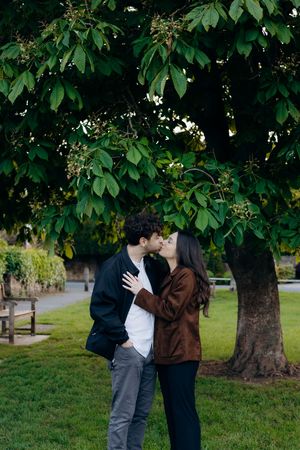 Couple celebrating their engagement in Broadway village.