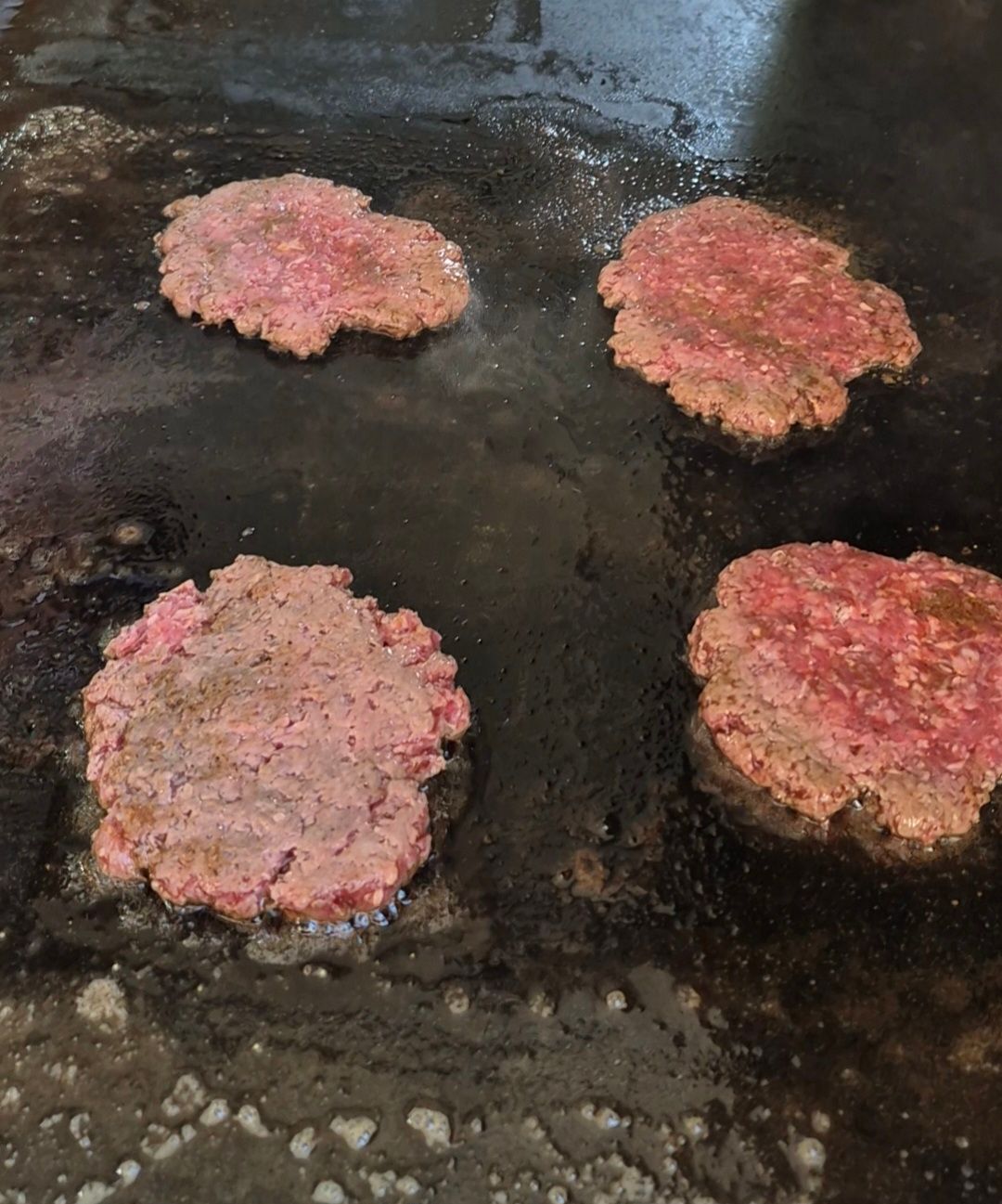 Smash burgers on the grill